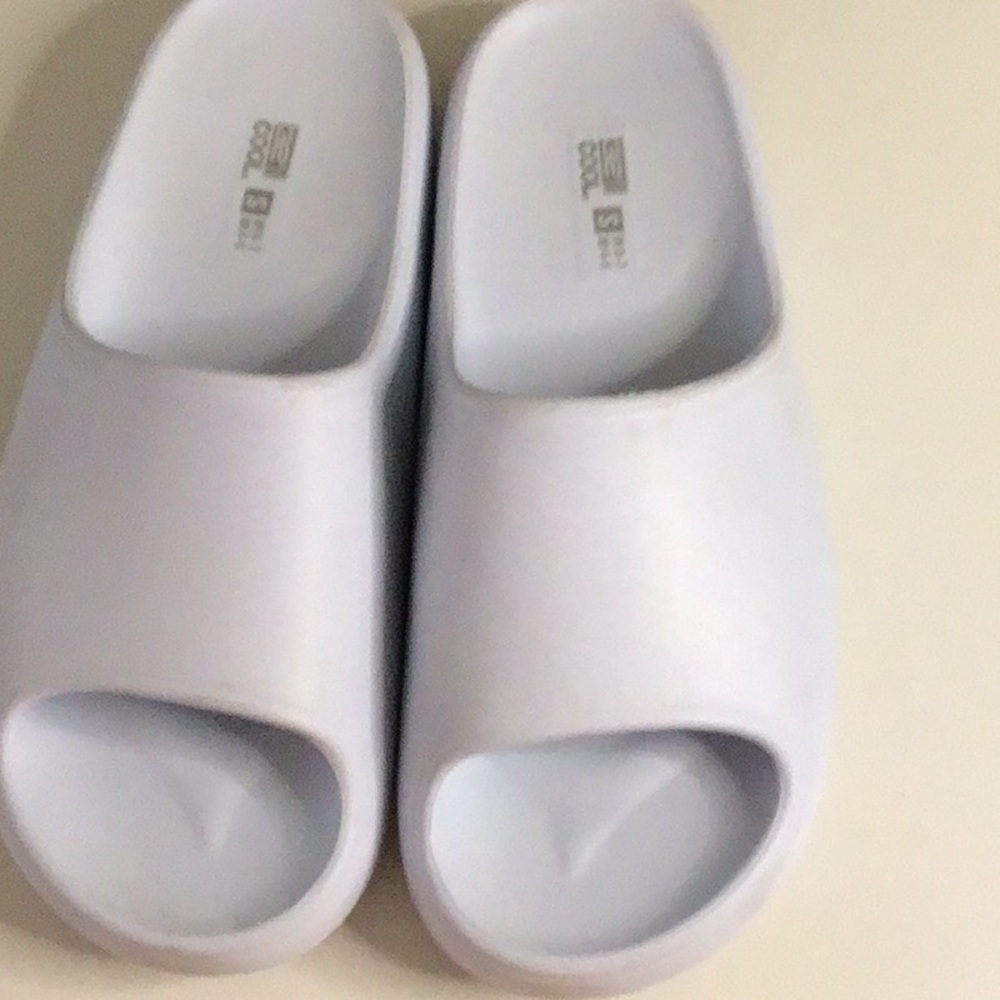 Light blue Slide Sandals has slight try on wear